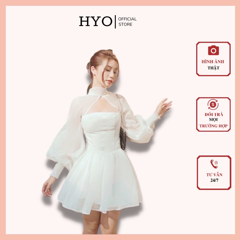 Đầm dự tiệc trắng HYO thiết kế tay bồng tiểu thư cut out ngực nơ lưng
