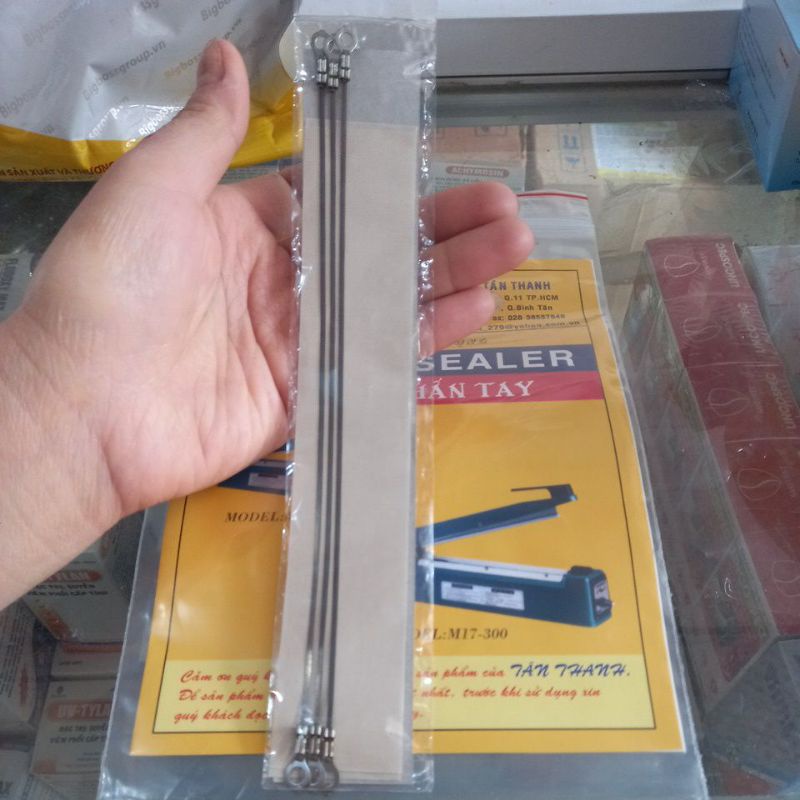 Dây nhiệt+ giấy chịu nhiệt máy ép túi Tân Thanh