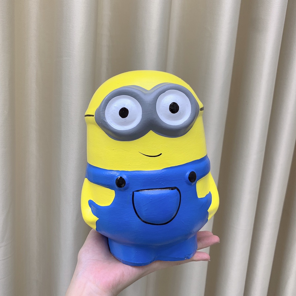 Lợn đất tiết kiệm cute dễ thương hình minion, con ống heo đẹp giá rẻ cao khoảng 20-22cm