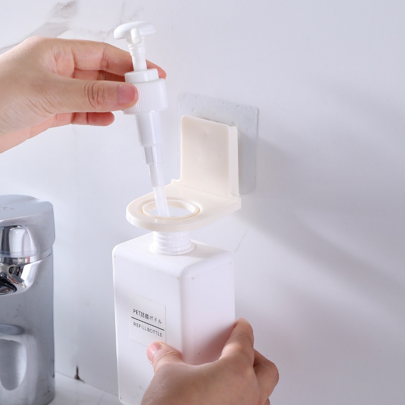 Móc treo chai sữa tắm- móc dán tường treo chai dầu gội
