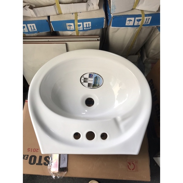 Chậu lavabo 3 lỗ Minh Long  giá rẻ  Kích thước: 50D*43R*17C mm có kèm giá đỡ chậu