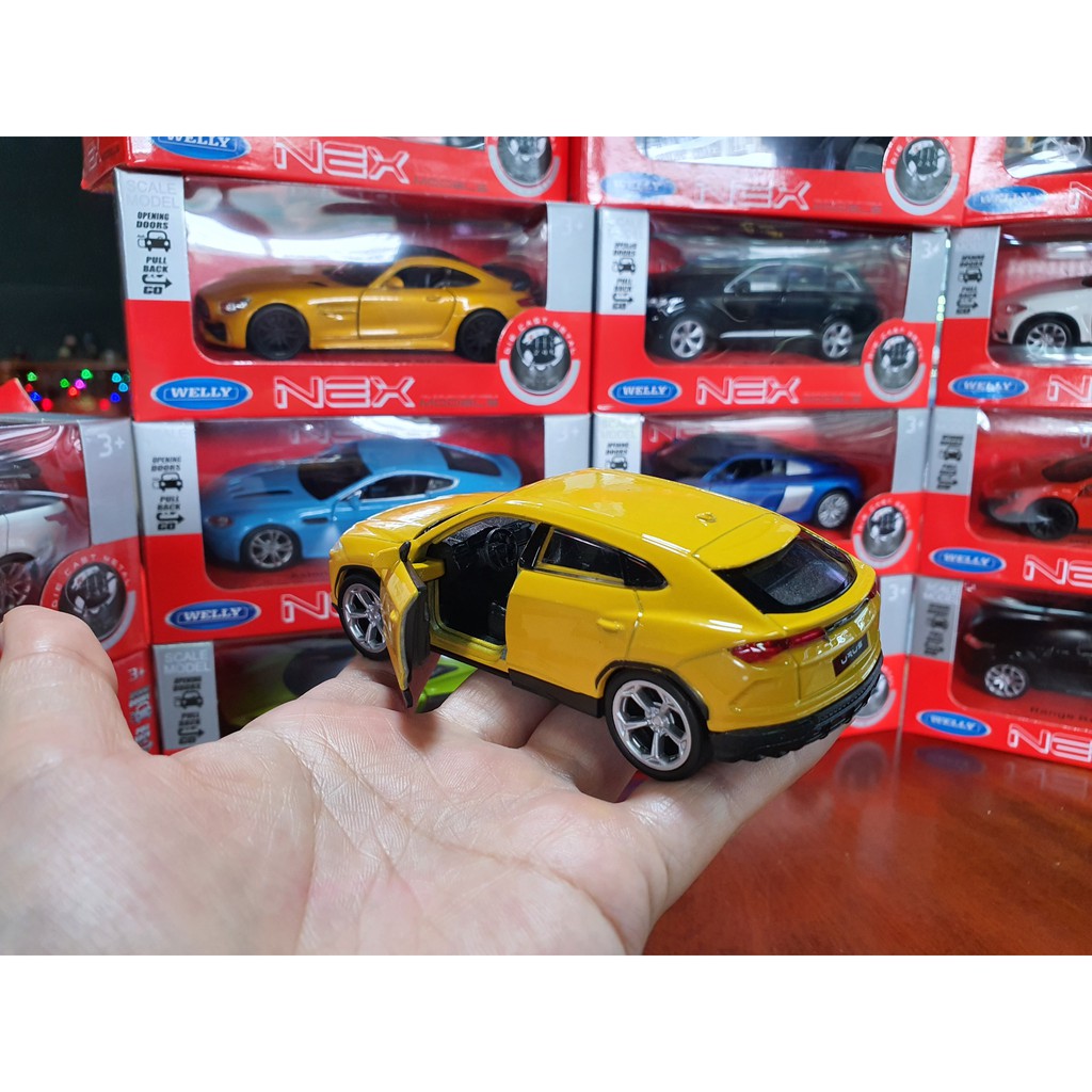 Xe Mô Hình Lamborghini Urus 1:34 Welly ( Vàng )