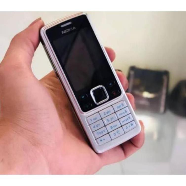 Điện thoại Nokia 6300 đầy đủ pin sạc màu bạc