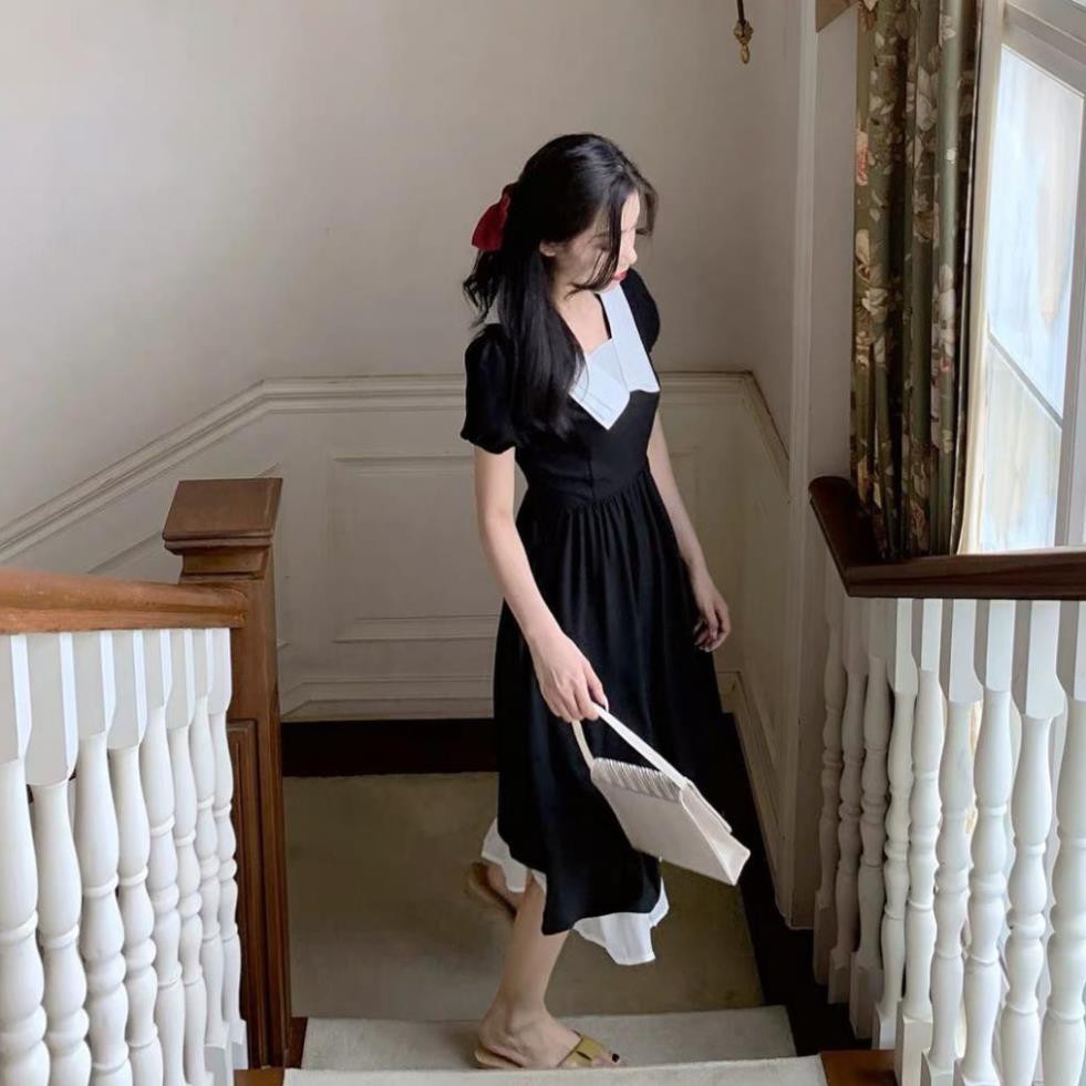 Đầm babydoll đen cổ trắng 3 lớp tay bo ngắn chân bèo voan trắng
