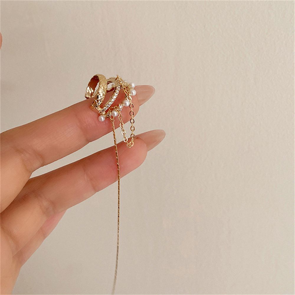 Bông tai dạng kẹp dáng dài nhiều lớp đính đá zircon lấp lánh phối tua rua cho nữ