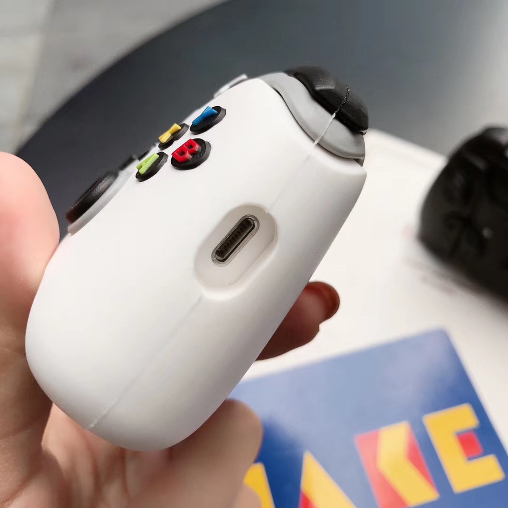 Vỏ Bảo Vệ Hộp Sạc Tai Nghe Airpods 2 Bằng Silicon Hình Tay Cầm Chơi Game Cổ Điển Phối Màu Trắng Đen Ốp