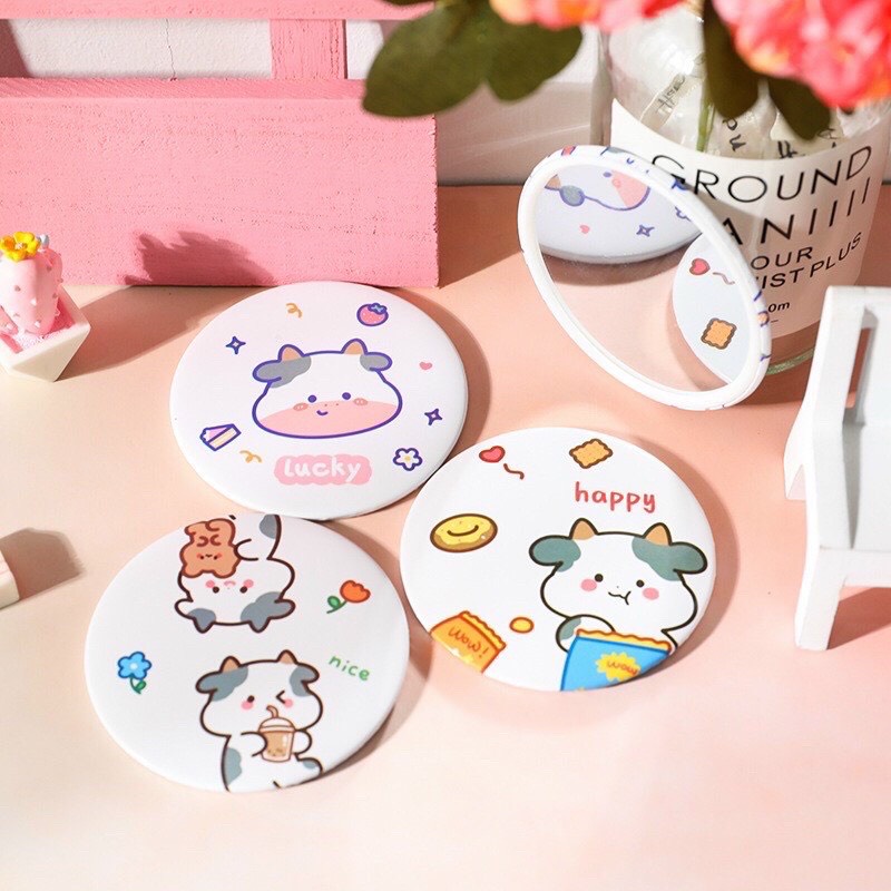 Gương trang điểm mini cầm tay bỏ túi dáng tròn dễ thương hình bò sữa