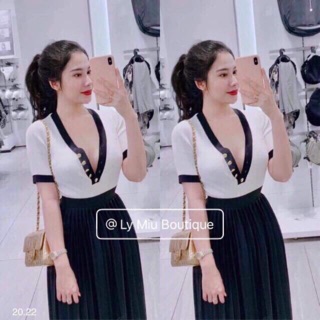 Áo thun gân viền cổ nút bấm