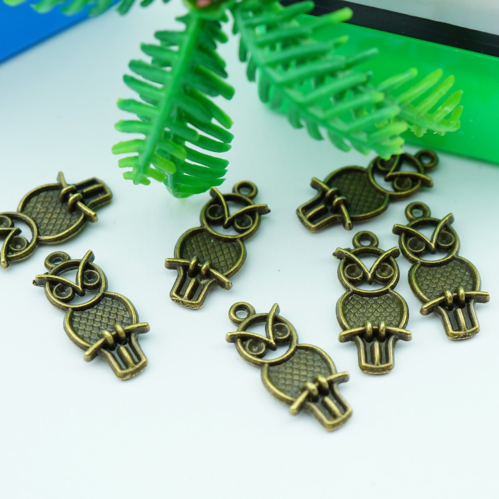 Mặt dây chuyền giả cổ làm đồ handmade màu đồng