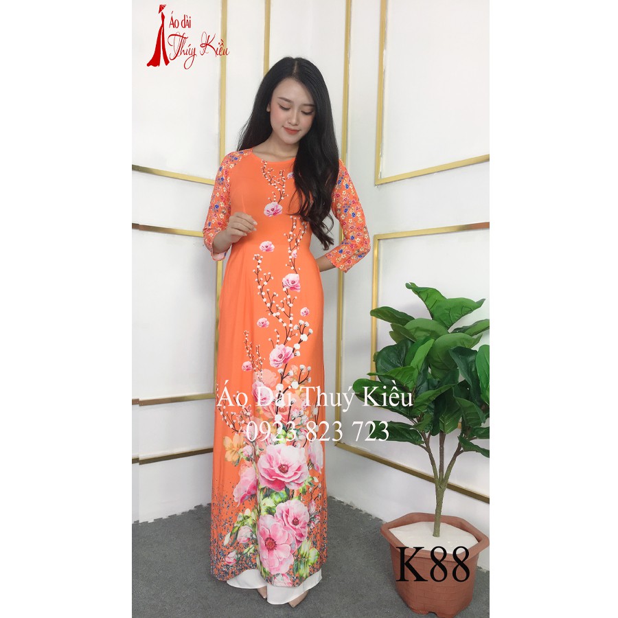 Áo dài nữ may sẵn thiết kế đẹp nền cam hoa đào cách tân tết K88 Thúy Kiều mềm mại, co giãn, áo dài giá rẻ