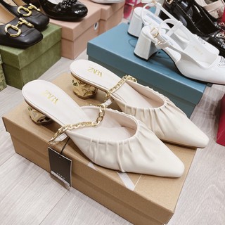 Sục Zara. quai xích