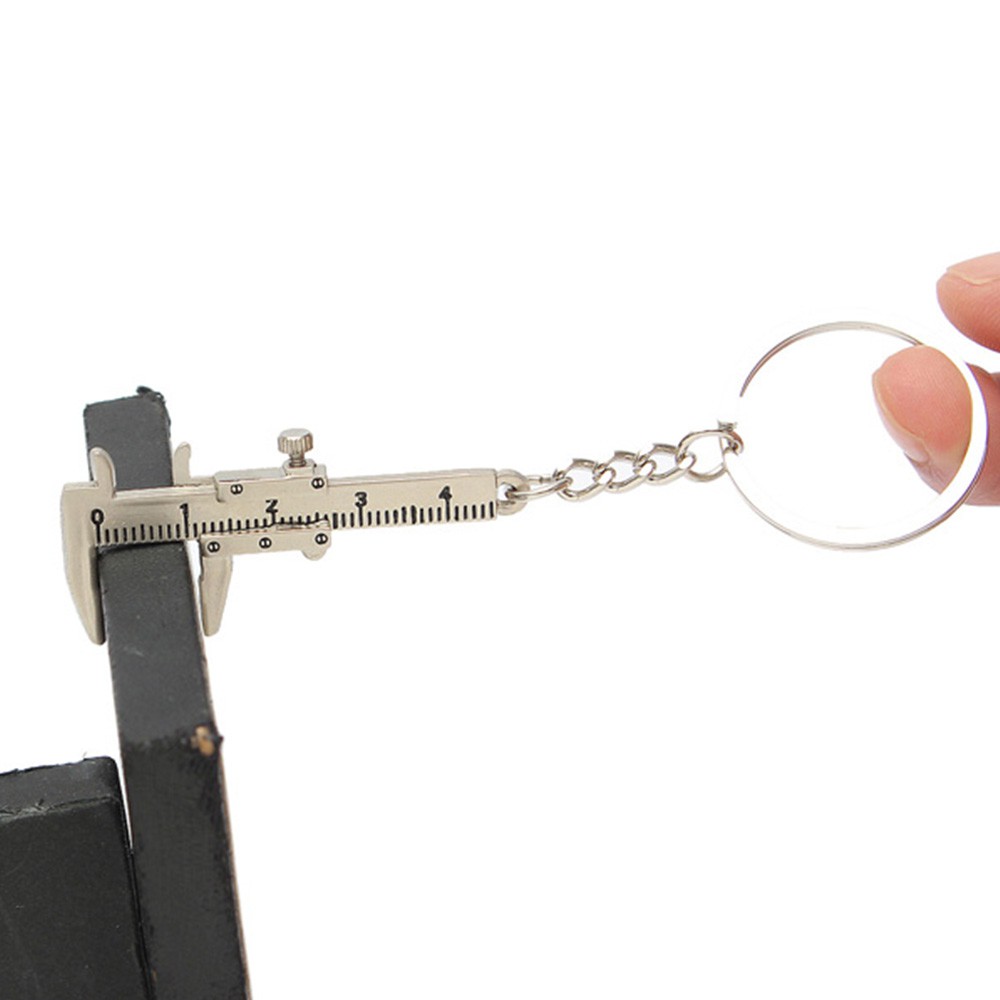 Móc chìa khóa kim loại hình thước cặp độc đáo