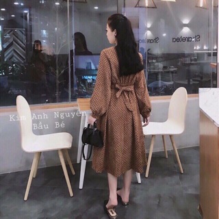 Váy nhung bi xoắn eo