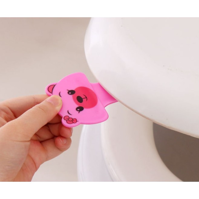 Miếng nhấc nắp bàn ngồi toilet