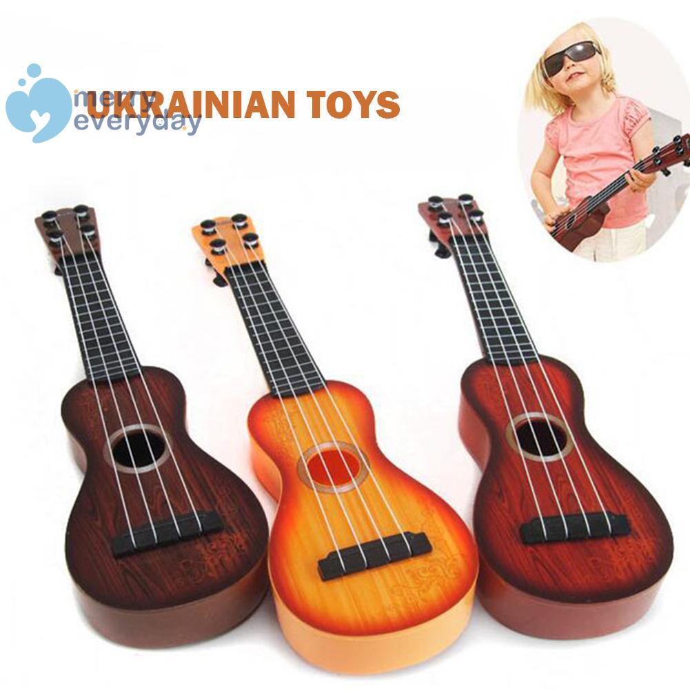 Đồ Chơi Đàn Guitar Bằng Gỗ Kiểu Cổ Điển Dễ Thương Cho Bé