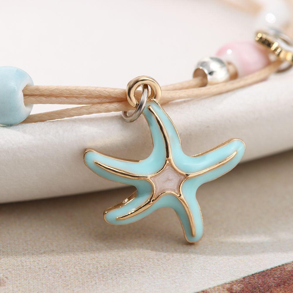 Vòng Tay Vỏ Sò Đan Tay Dễ Thương Cho Bạn Gái