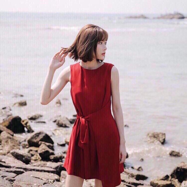 Đầm không tay sát nách tà chéo thắt nơ eo