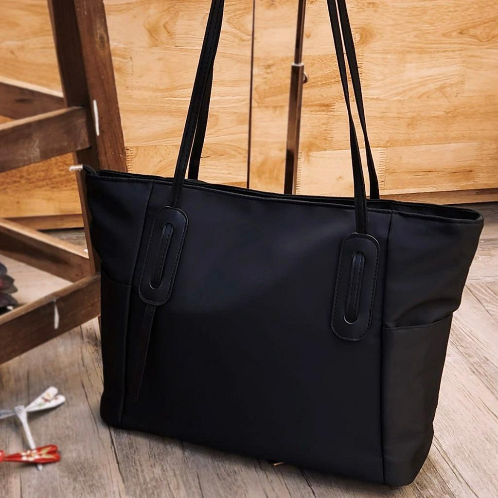 Black waterproof tote bag