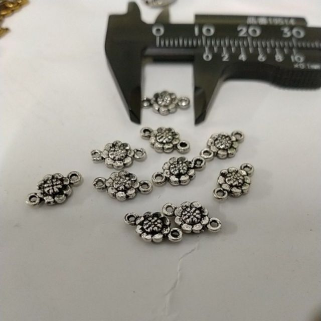 Mặt hoa 2 lỗ treo nhỏ 6x10mm