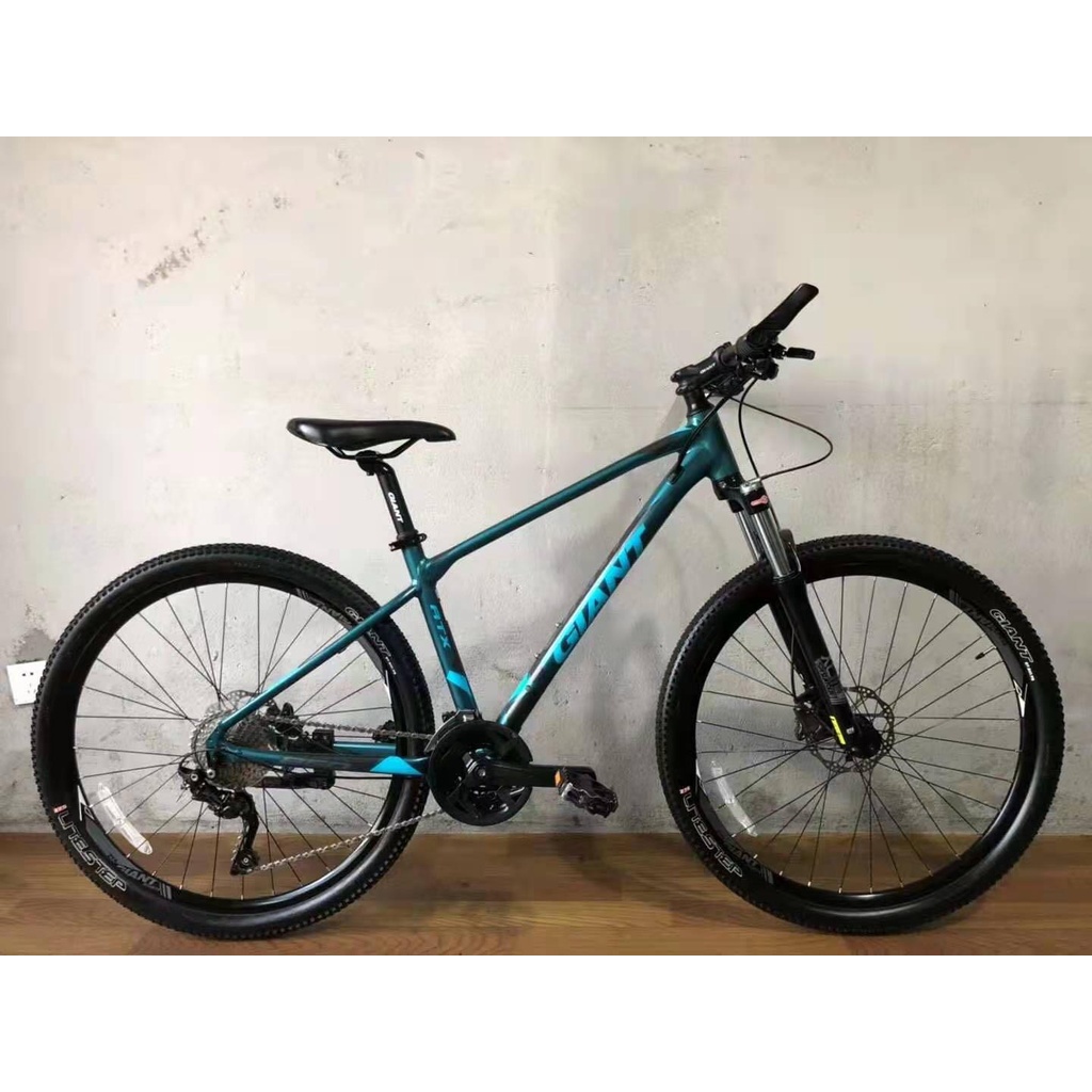 Xe đạp địa hình GIANT ATX 860 phiên bản 2021, Khung sườn hợp kim nhôm ALUXX, Bộ truyền động Shimano Deore, Màu xanh