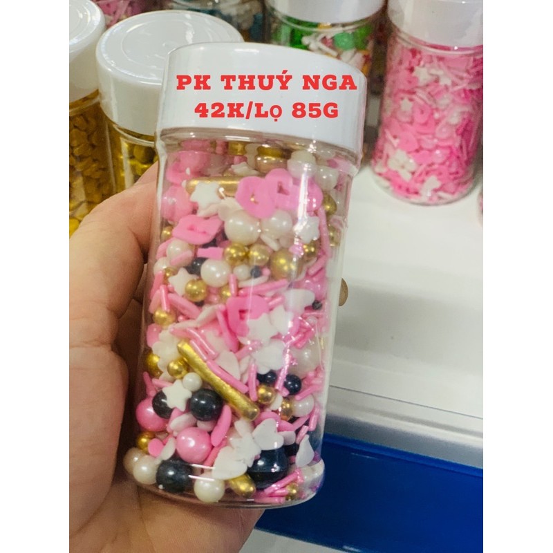 cốm hồng đen + cốm dài vàng (túi 100gam)-Q1161