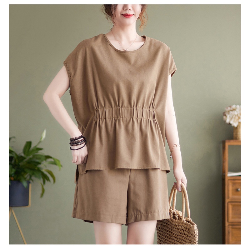 Bộ nữ gồm áo sát nách quần short thiết kế trẻ trung, chất đũi cao cấp mềm mịn.  H9