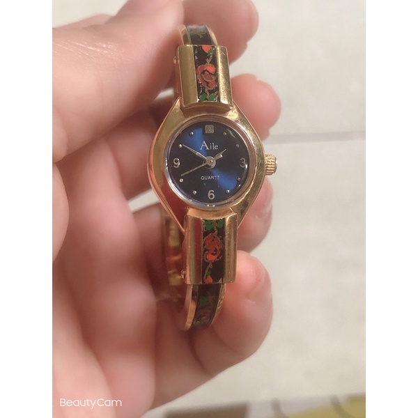 còng đồng hồ bọc vàng nữ hiệu aile quartz