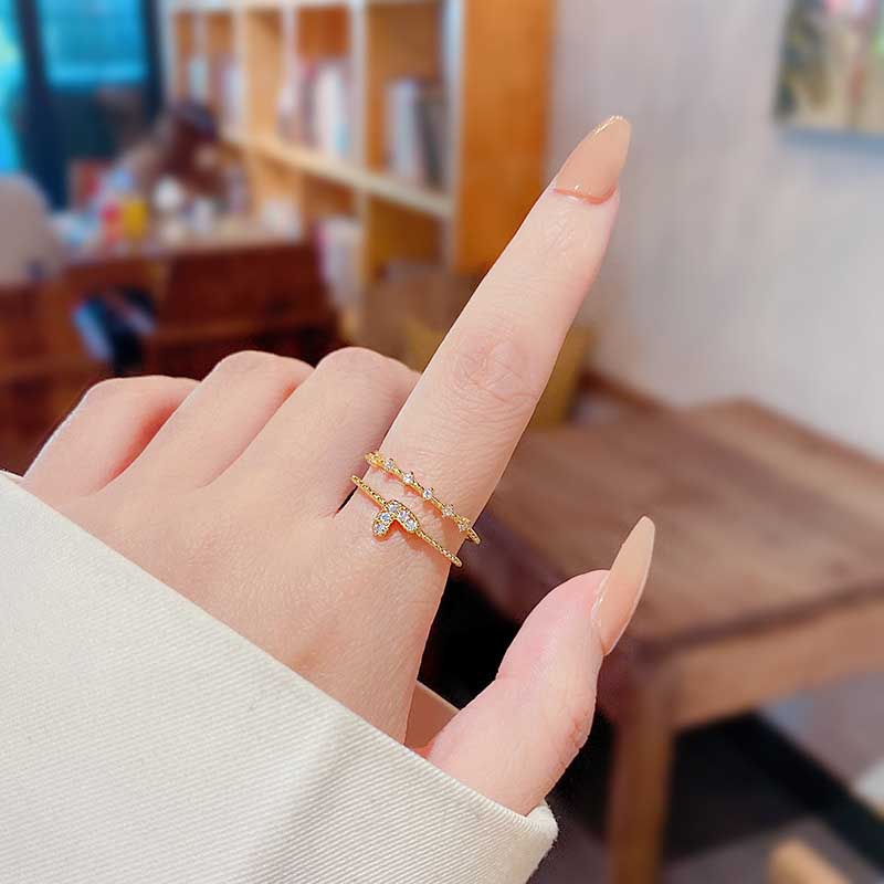 Nhẫn Đính Hôn Bằng Thép Titan Mạ Vàng Hai Lớp Đính Đá Zircon Hình Trái Tim Thời Trang Cho Nữ