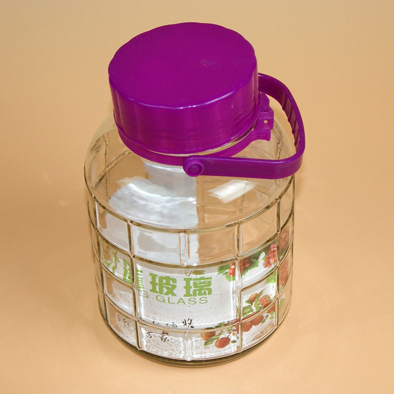 Bình thủy tinh nắp tím có quai xách 2l