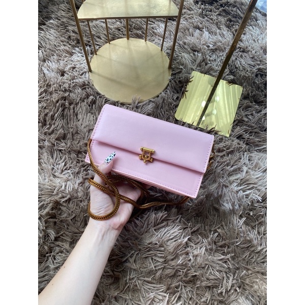 Túi xách nữ đeo chéo Charles and Keith dây tết mẫu mới