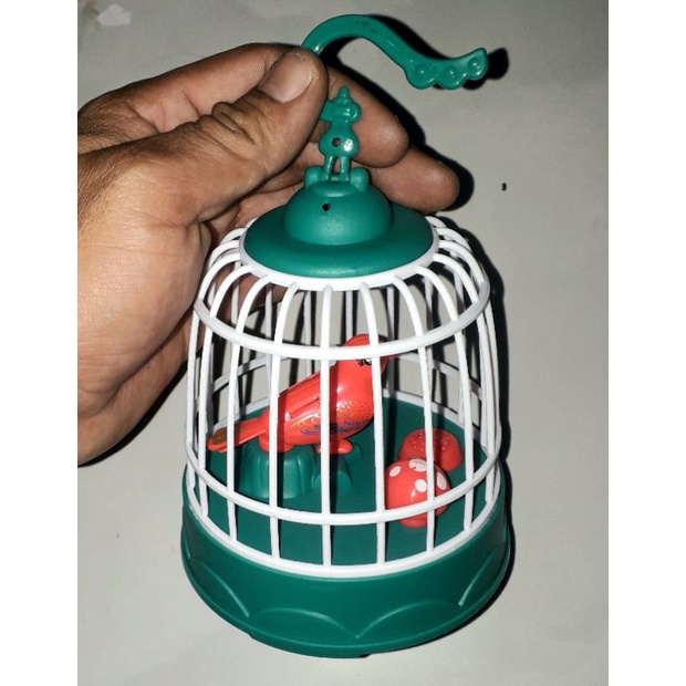 Một chiếc lồng chim mini bằng nhựa có nhạc và đèn rất đẹp Tặng kèm pin