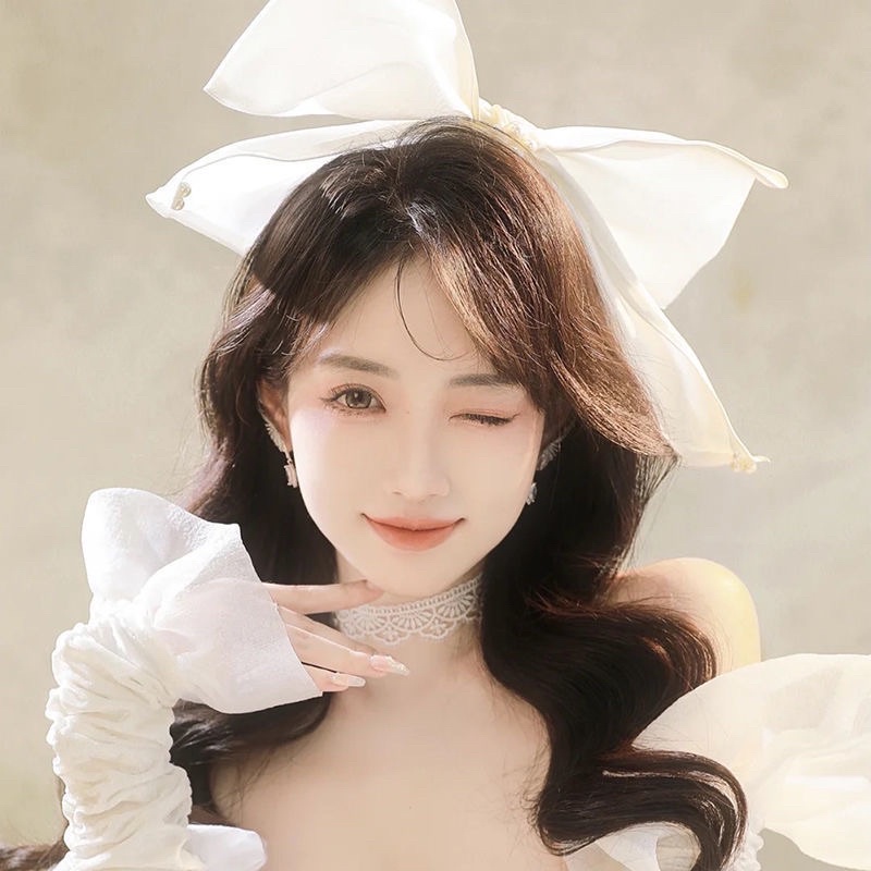 Nơ kẹp tóc đính ngọc