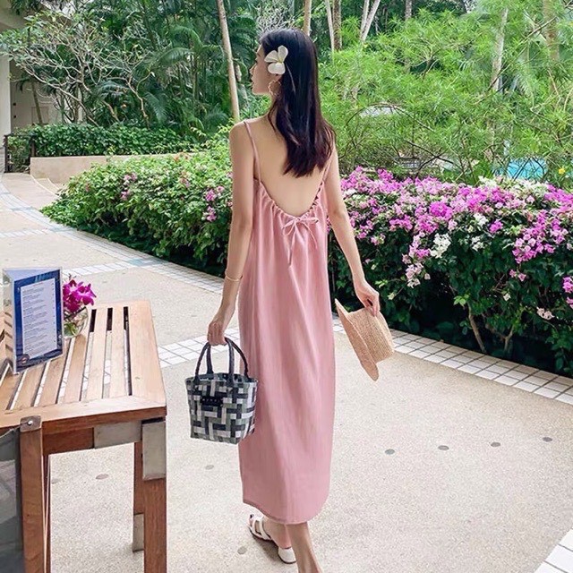 váy 2 dây đi biển hở lưng thắt nơ chất đũi xinh xắn