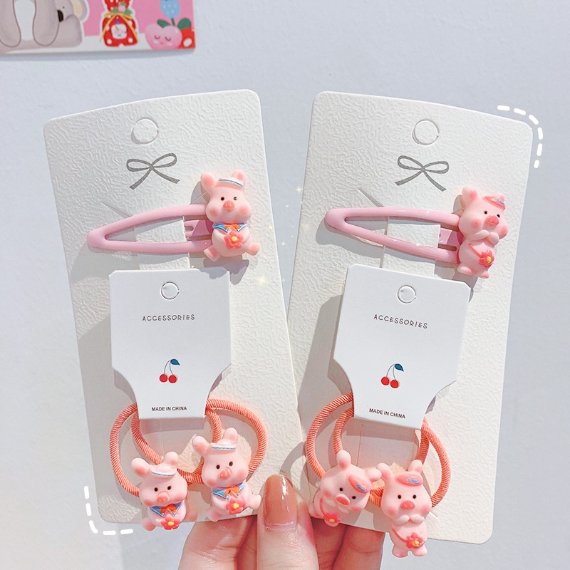 Dây thun cột tóc gắn hình chú heo hồng đáng yêu cho bé gái