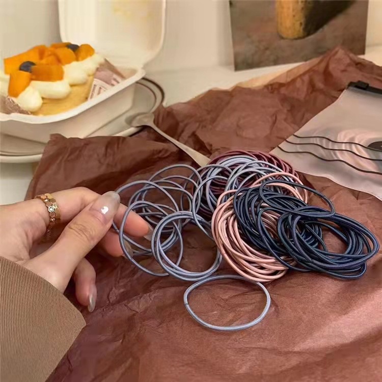 Set 100 Dây Thun Buộc Tóc 1 Lỗ Co Giãn Tốt Tiện Dụng Cho Nữ