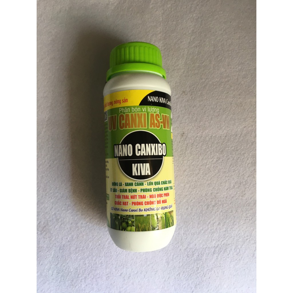 Phân bón lá Nano Canxibo  , chai 500 ml , dùng cho mọi cây trồng , chống rụng trái thối trái , làm lớn trái ngọt trái