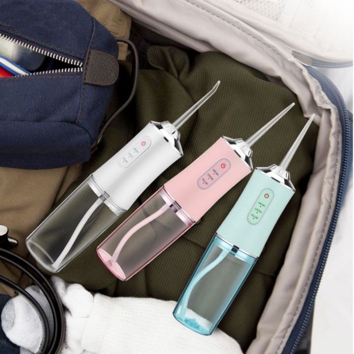 Máy tăm nước cầm tay  Oral Irrigator - Tăm nước xịt vệ sinh làm sạch kẽ răng miệng công nghệ Châu Âu, 3 chế độ xịt