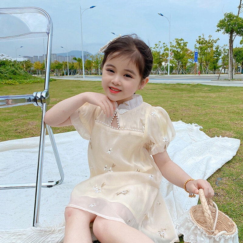 Đầm sườn xám tay phồng IQ Angel đính ngọc trai giả phong cách Trung Hoa cho bé gái