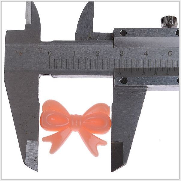 10/25/50gam hạt nhựa hình Nơ 23x29mm có lỗ