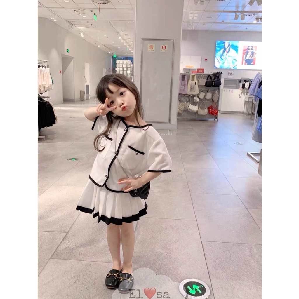 Váy bé gái - Set áo trắng bo viền đen kèm chân váy xếp ly siêu xinh cho bé gái 1 - 7 Tuổi