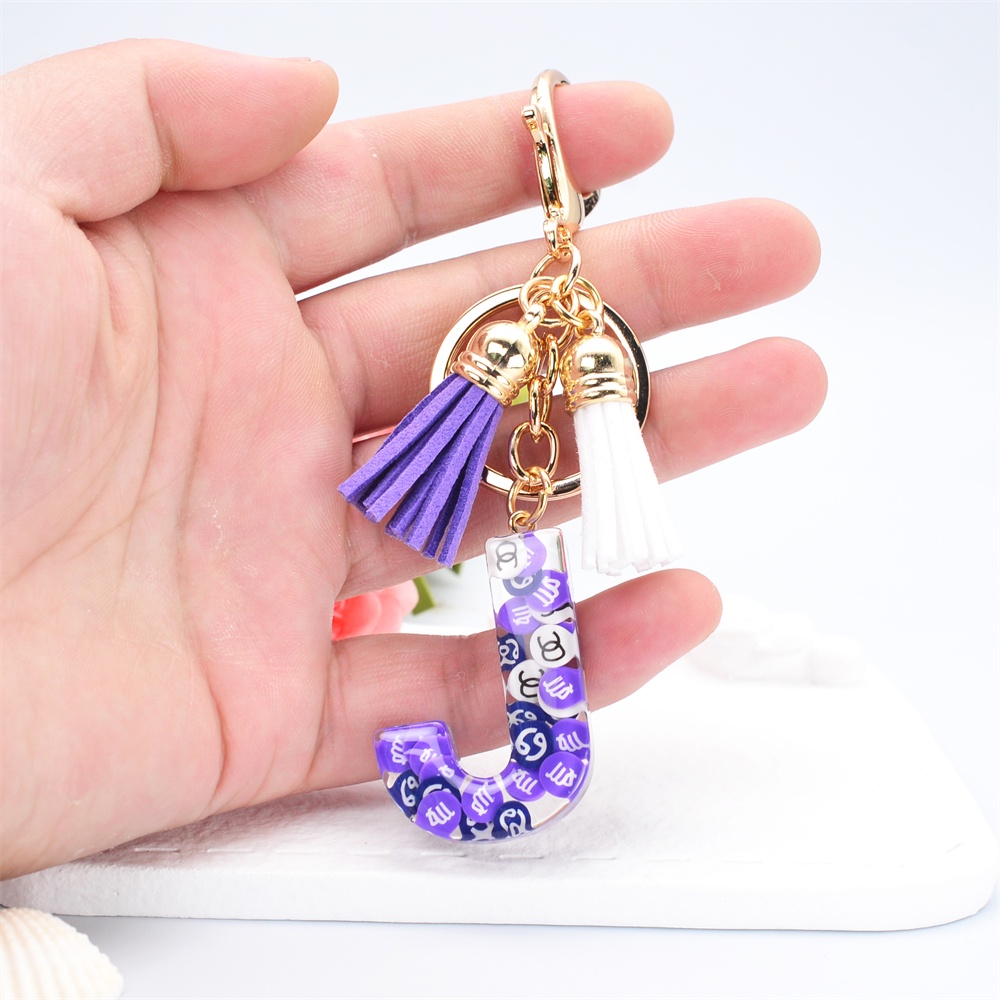 Móc Khóa 26 Chữ Cái Gắn Núm Tua Xinh Xắn Charms