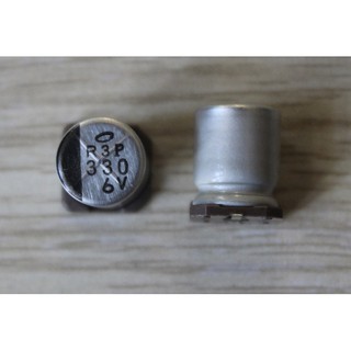 100 con tụ dán tròn R3P 330 6V