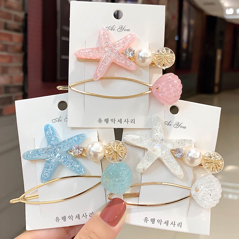 (Bán Buôn Sỉ) Set 2 kẹp tóc đá sao biển, sò biển
