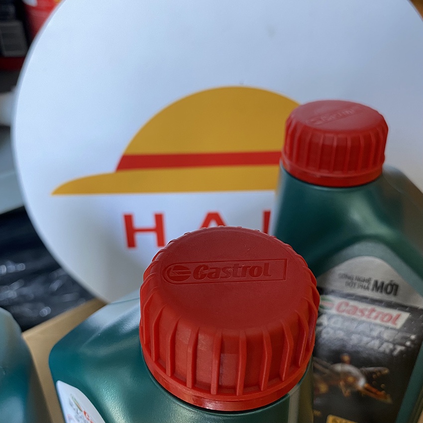 Dầu nhớt ô tô 5W30 Castrol Magnatec chai 1l: nhớt ô tô Castrol tổng hợp toàn phần cho máy xăng, dầu diesel và xe hybrid