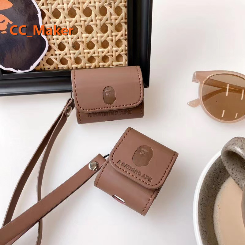 Bao da mềm họa tiết BAPE bảo vệ cho hộp sạc tai nghe AirPod 1/2/Pro kèm dây đeo ngắn | BigBuy360 - bigbuy360.vn