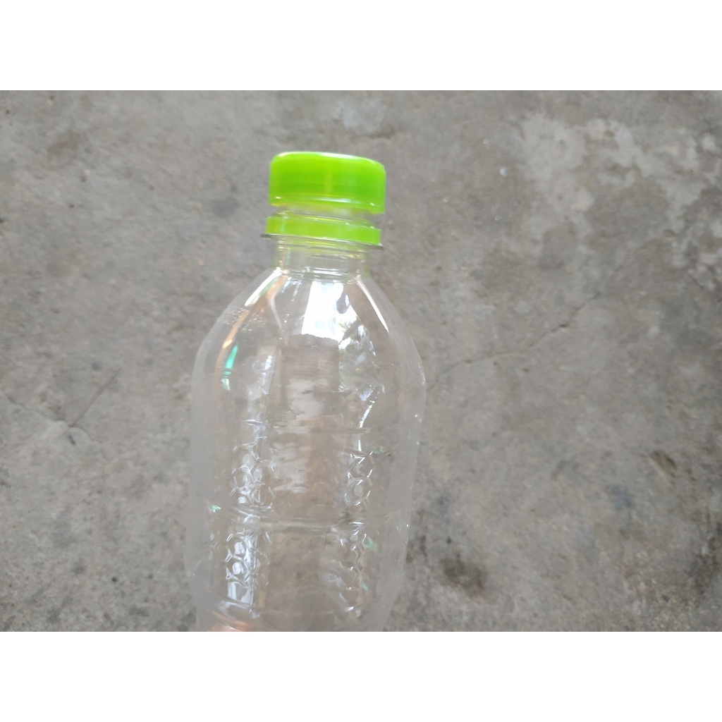 Chai nhựa 500ml chứa nước tưới nhỏ giọt