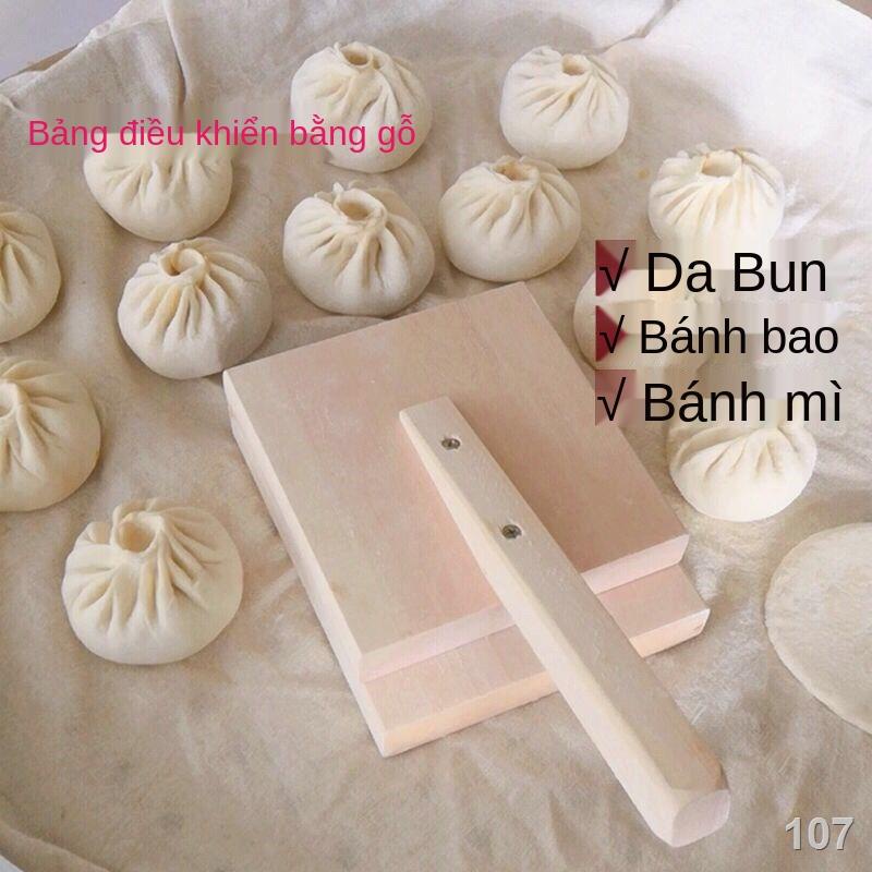 NGiấy gói bánh bao, hiện vật nhồi bột cán cỡ nhỏ, nhào bột làm bánh bao, giấy gói hấp, gói hấp bánh bao, nghệ nhân nhồi