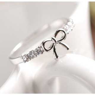 Simple bow diamond ring