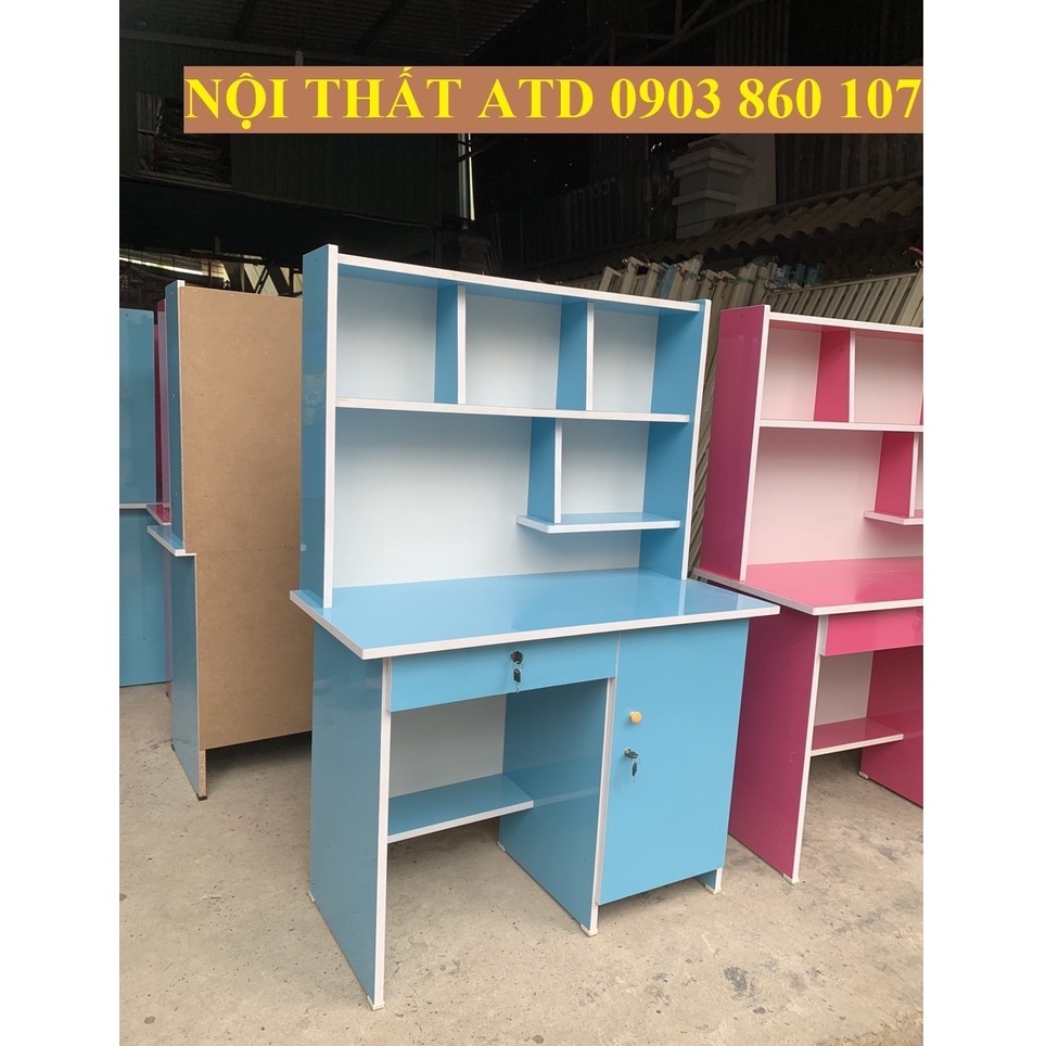 Bàn học sinh tiểu học cho bé gái màu hồng 80cm 1m 1m2 có kệ sách bình dương hcm