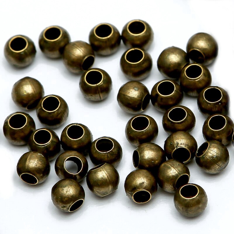 1000 Hạt xỏ lỗ hình tròn 3mm bằng thép không gỉ dùng làm đồ trang sức thủ công